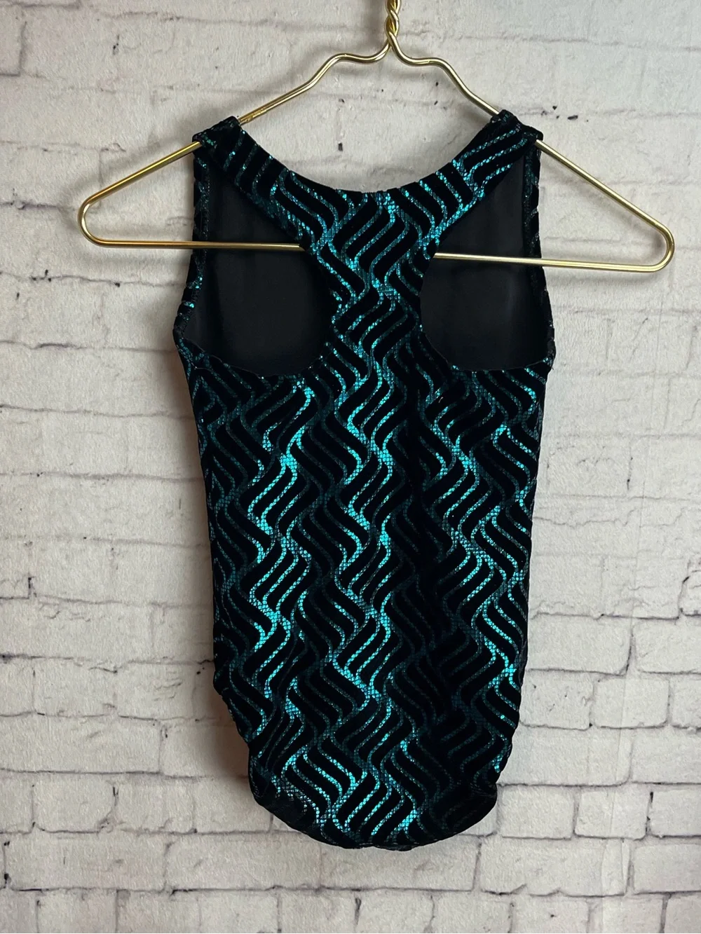 Alpha Factor size child’s large black and turquoise leotard
